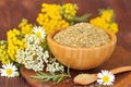 Dry herbal tea in wooden bowl Royalty Free Stock Photo