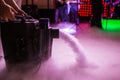 Dry ice low fog machine with hands on for wedding first dance in restaurants Royalty Free Stock Photo