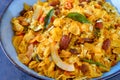 Dry Indian Snack-Corn Flakes trail mix in blue bowl Royalty Free Stock Photo