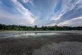 Dry lake in Bavaria Germany. Drought and climate change, landscape of cracked earth after lake has dried up in summer. Water Royalty Free Stock Photo