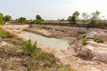 Dry land with broken soil represent hot weather and global warming. Aerial view showing low water level . Climate change and droug