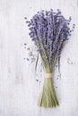 Dry lavender bunch on vintage wooden table from above. Rustic style. Royalty Free Stock Photo