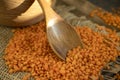 Dry lentils spoon on wooden food agriculture consumption