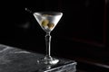 Dry Martini cocktail on a bar desk. black background Royalty Free Stock Photo