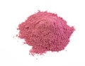 Dry matcha pink tea powder isolated on white background