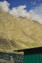 Dry mountain covered with clouds with longest steel bridge on Manali-Leh highway which located in Darcha Royalty Free Stock Photo