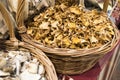 Dry mushrooms are sold in wicker box Royalty Free Stock Photo