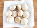 Dry mushrooms on a white kitchen towel after washing. For cooking a soup soup Royalty Free Stock Photo