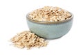 Dry oat flakes in bowl isolated on white Royalty Free Stock Photo