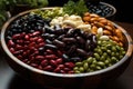 Dry Organic Assorted Bean, Colorful organic beans on a burgundy background, Many variety of beans