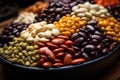 Dry Organic Assorted Bean, Colorful organic beans on a burgundy background, Many variety of beans