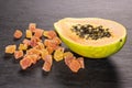 Dry papaya on grey stone Royalty Free Stock Photo
