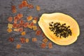 Dry papaya on grey stone Royalty Free Stock Photo