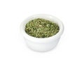 Dry parsley in ceramic bowl on white background Royalty Free Stock Photo