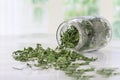 Dry parsley in glass jar Royalty Free Stock Photo