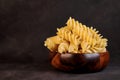 Dry pasta closeup uncooked on background