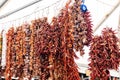 Dry peppers hanging on a market