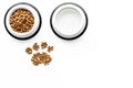 Dry pet - cat food in bowl on white background top view mock up Royalty Free Stock Photo