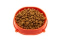 Dry pet food in a bowl on a white background Royalty Free Stock Photo
