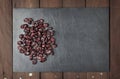 Dry red cranberries on a slate plate with copy space Royalty Free Stock Photo