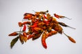 Dry red hot chili pepper, cayenne pepper, dried chillies on white background. Isolate, free space, close-up. Royalty Free Stock Photo