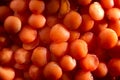 Dry red lentils very close. Red lentil grits. Dried orange lentil grains, pile of daal, raw daal, dhal, masur, Lens