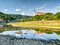 Dry riverbed of river Elbe in Decin, Czech Republic. Castle above old railway bridge Royalty Free Stock Photo
