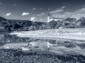 Dry riverbed of river Elbe in Decin, Czech Republic. Castle above old railway bridge Royalty Free Stock Photo