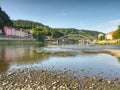 Dry riverbed of river Elbe in Decin, Czech Republic. Castle above old railway bridge Royalty Free Stock Photo