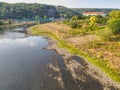 Dry riverbed of river Elbe in Decin, Czech Republic. Castle above old railway bridge Royalty Free Stock Photo