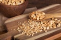 Dry Roasted Peanuts on a Wooden Cutting Board Royalty Free Stock Photo