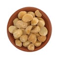 Dry roasted and salted macadamia nuts in a bowl Royalty Free Stock Photo