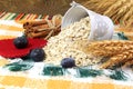 Dry rolled oatmeal flakes in heart bucket with blueberry cinnamon oat ears and heart Royalty Free Stock Photo