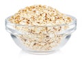 Dry rolled oats in a small transparent glass round bowl isolated on white background Royalty Free Stock Photo