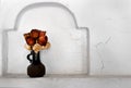 dry roses in a ceramic vase Royalty Free Stock Photo