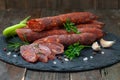 Dry sausages made of pork meat with fresh herbs and spices