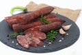 Dry sausages made of pork meat with fresh herbs and spices