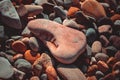 Sea pebbles close up texrured background