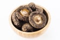 Dried shiitake mushrooms on a Wooden bowl Royalty Free Stock Photo