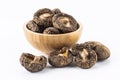 Dried shiitake mushrooms on a Wooden bowl Royalty Free Stock Photo