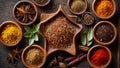 Dry spices wooden bowls an old background