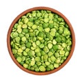 Dry split green peas in a bowl isolated on white background, top view Royalty Free Stock Photo