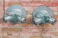 Dry Standpipe Fire Department Connection on an brick building wall Royalty Free Stock Photo