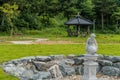 Dry stone circled water fountain in park Royalty Free Stock Photo