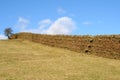 Dry stone wall with stile built in.