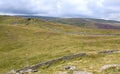 Dry stone walls and high moorland.