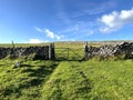 Old farm gate, leading into the fields above, Kettlewell, Yorkshire, UK Royalty Free Stock Photo