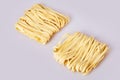 Dry thick rolled noodles square shape. Capelli d`angelo, Angel`s hair - pasta.