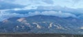 Dry treeless mountain slopes in the south of Altay. Storm clouds