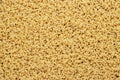 Dry uncooked cavatappi pasta texture background Royalty Free Stock Photo